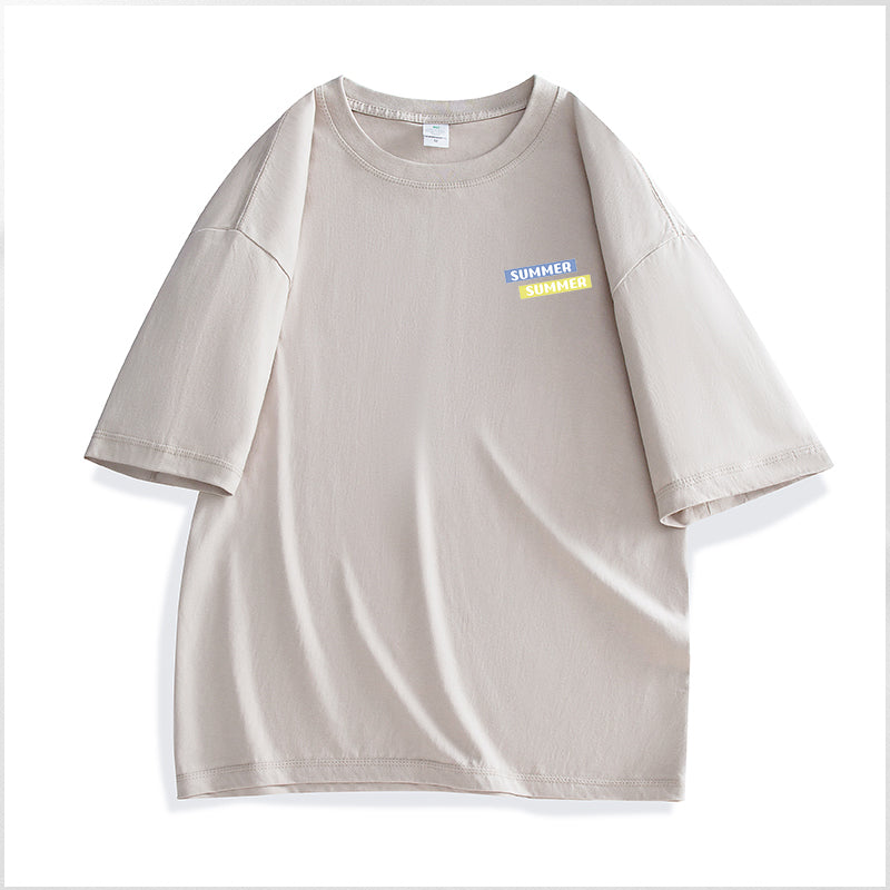 Beige t-shirt with a small colorful label on a white background