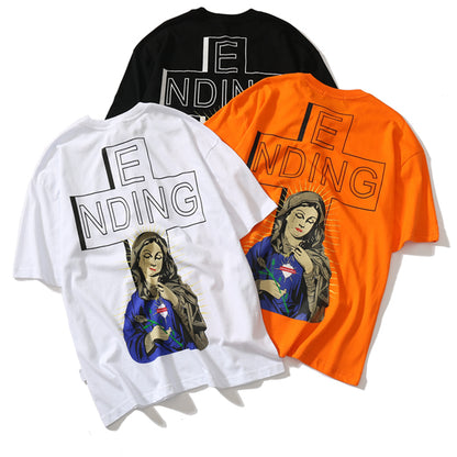Three t-shirts with artistic designs and text on a white background
