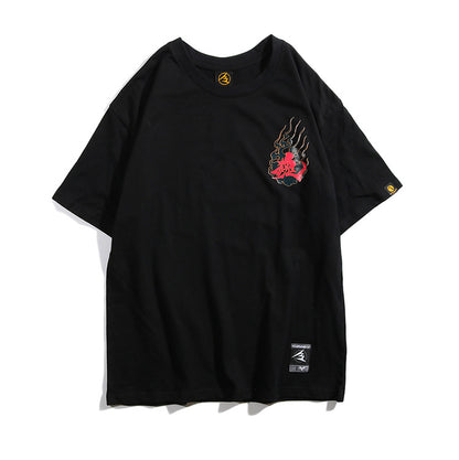 Black t-shirt with a graphic design on a white background