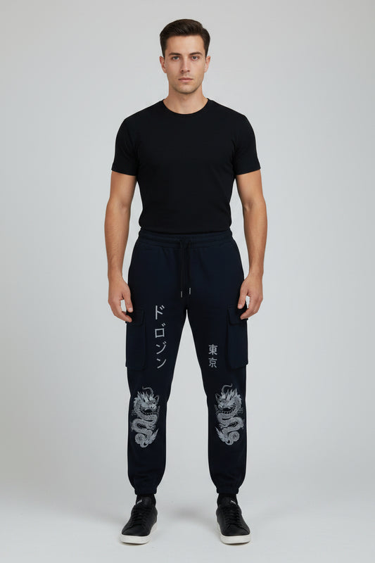 Black pants with white dragon designs and text on a white background