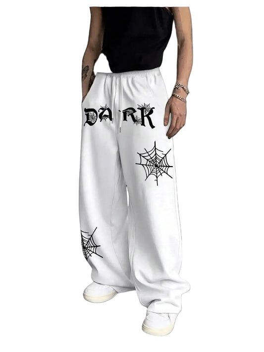 White pants with 'DARK' text and spider web designs on a white background